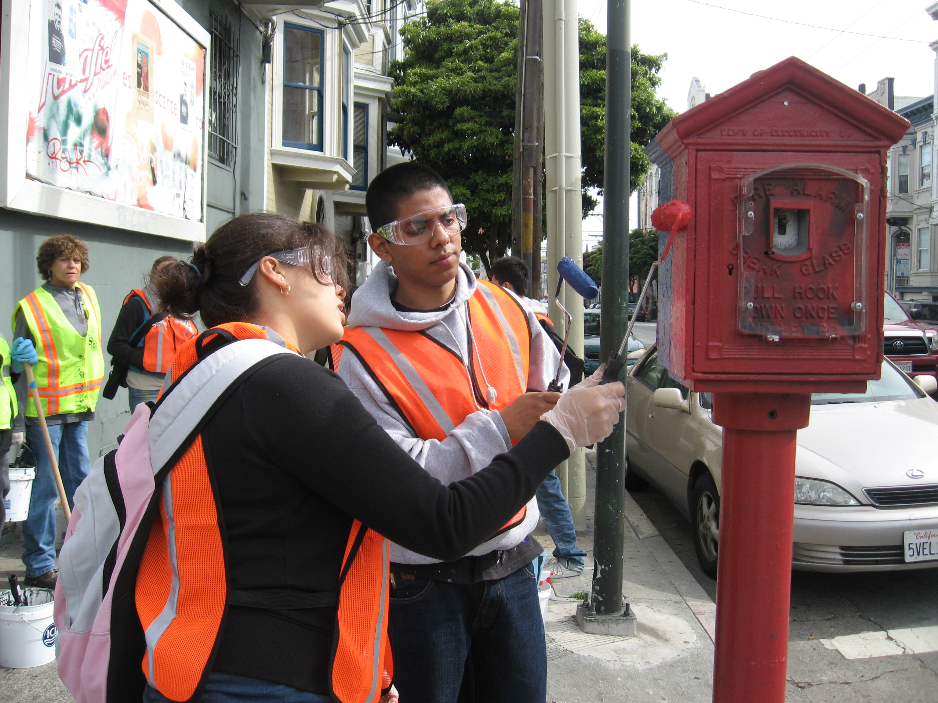 Graffit Watch volunteers in action removing graffiti.