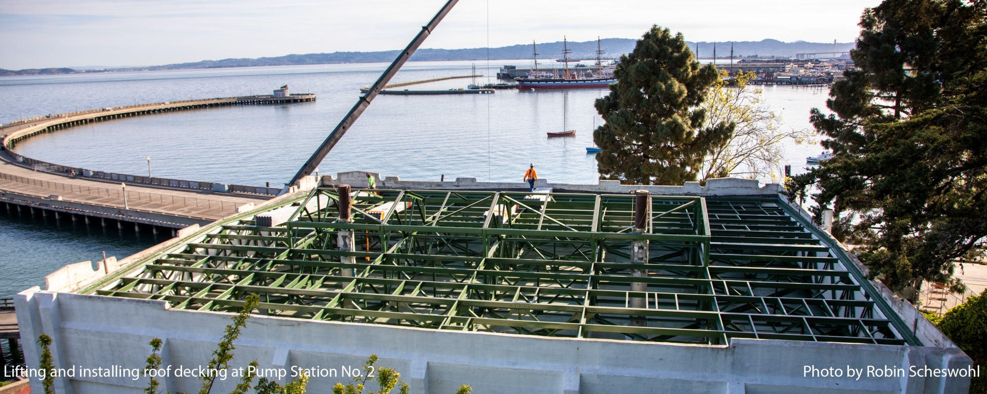  Lifting and installing roof decking at Pump Station No. 2.